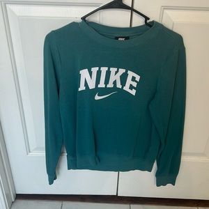 Teal Nike sweatshirt. Small blemish will probably wash out. Small.